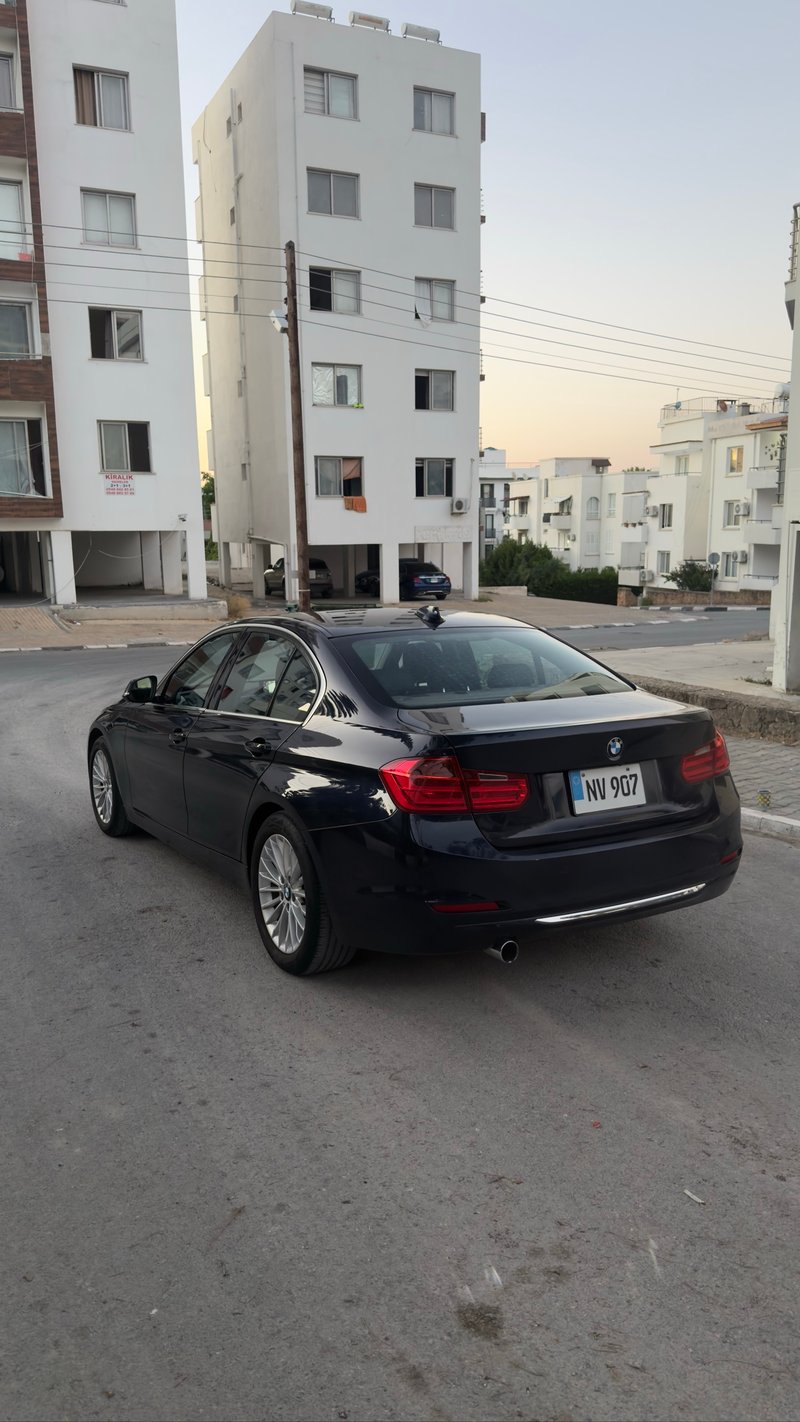 BMW 320i — 3
