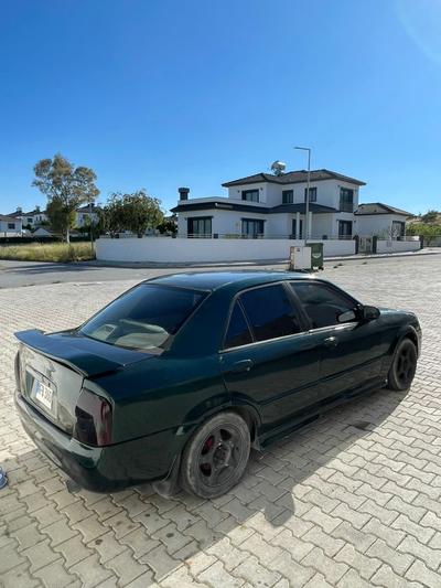 Mazda Familia — 3