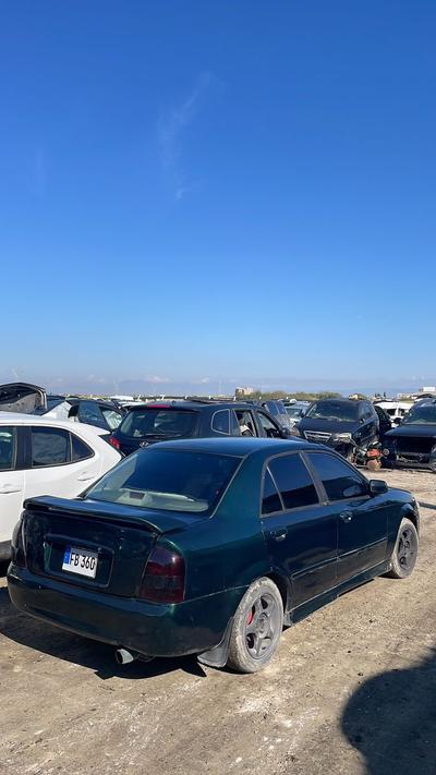 Mazda Familia — 8