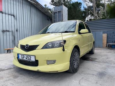 Mazda Demio — 1