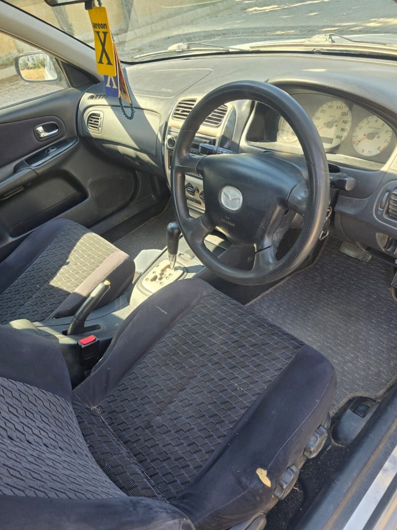 Mazda Familia — 4