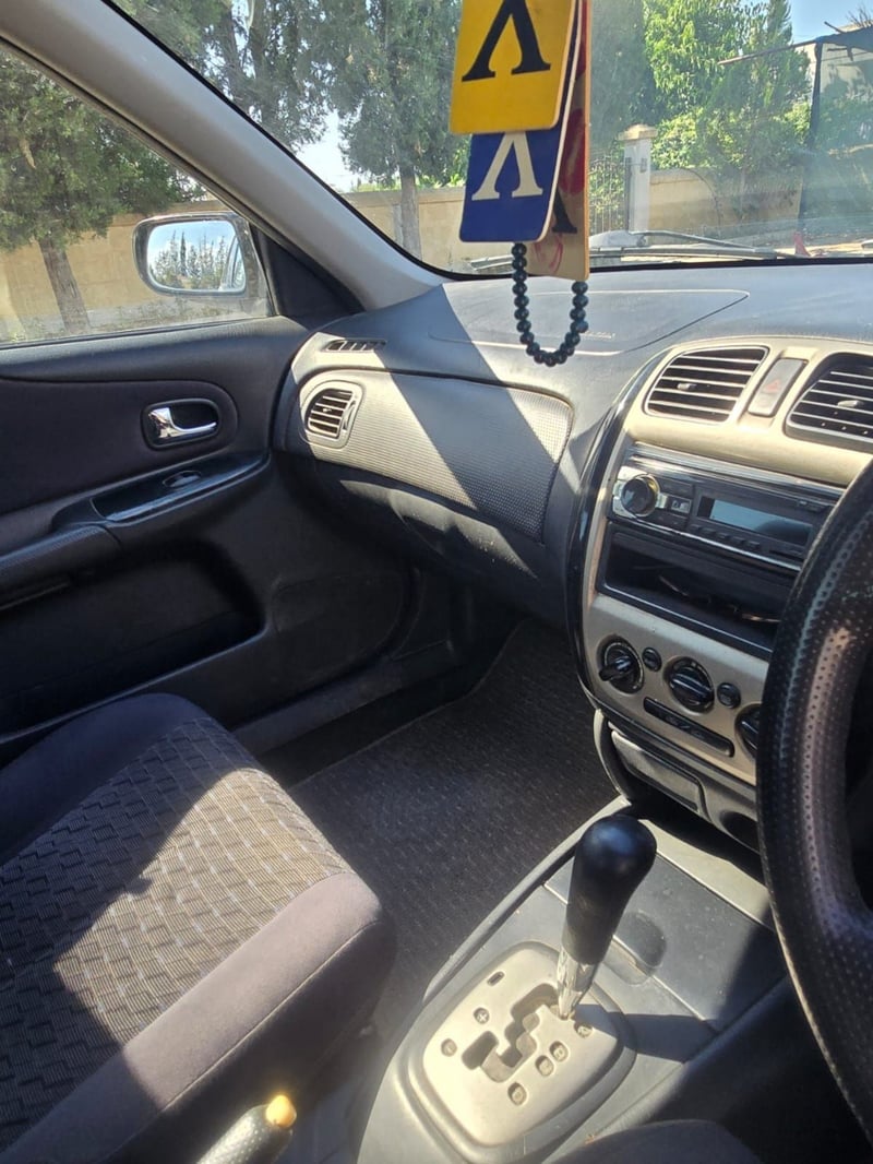 Mazda Familia — 7