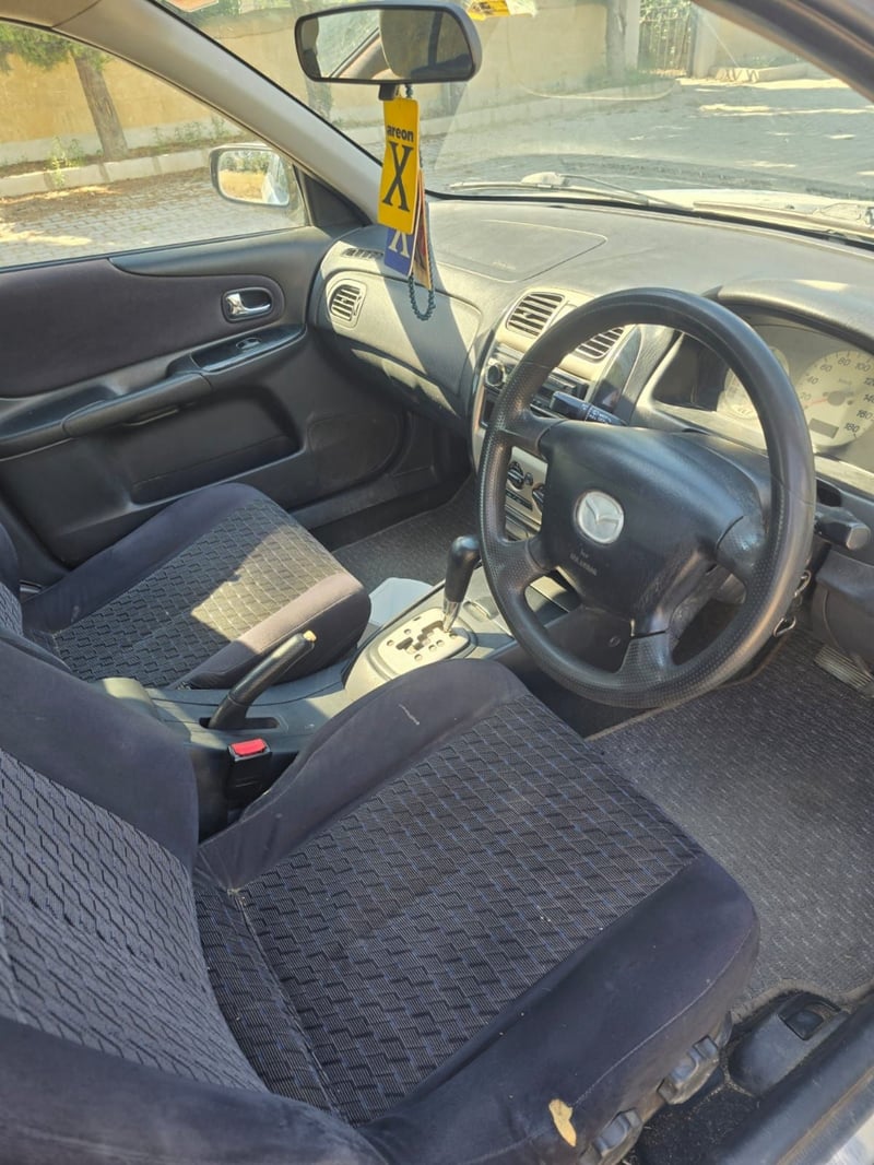 Mazda Familia — 10