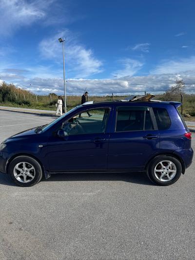 Mazda Demio — 3