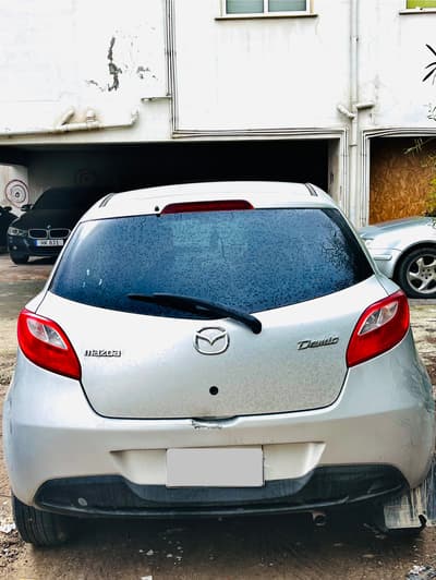 Mazda Demio — 4