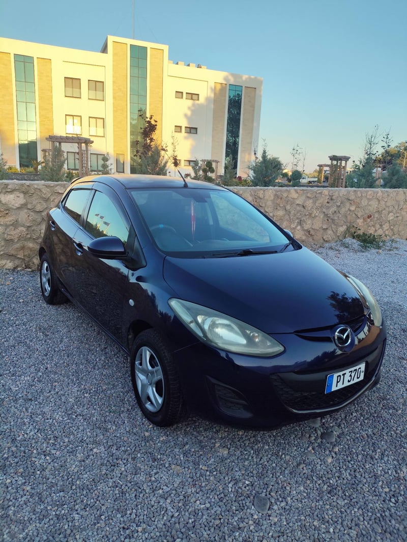 Mazda Demio — 3
