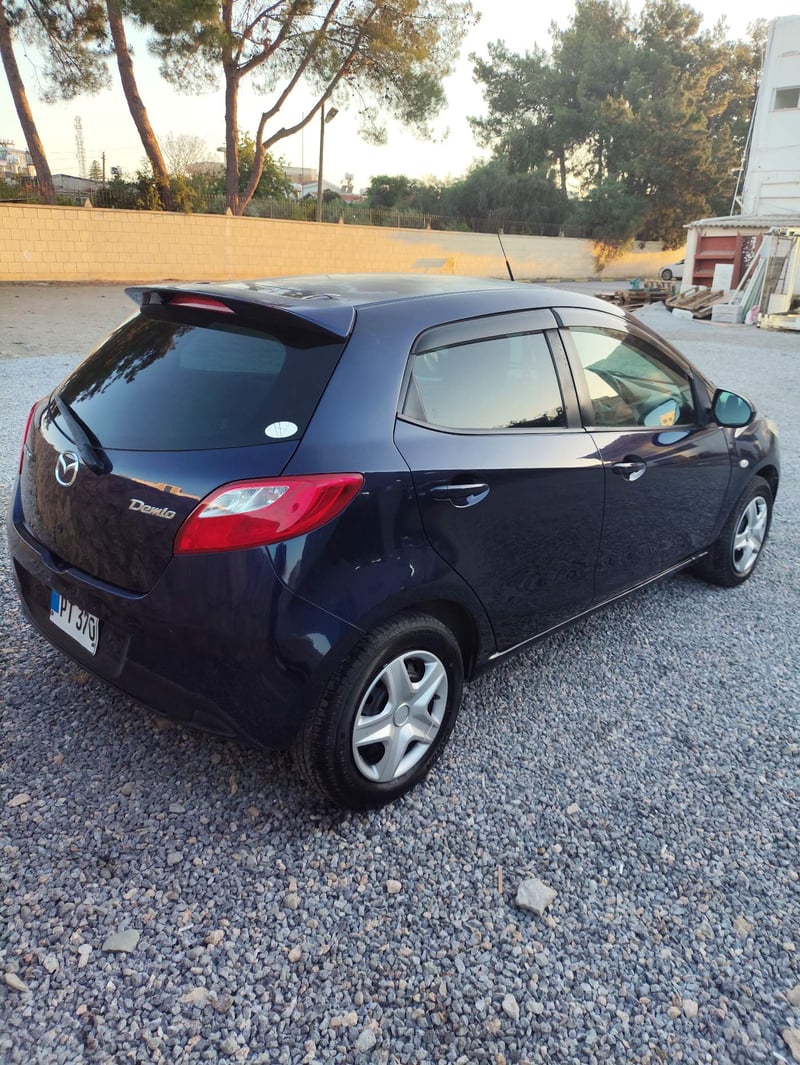 Mazda Demio — 5