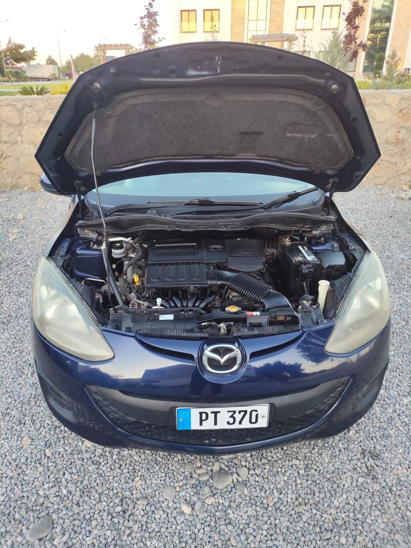 Mazda Demio — 6
