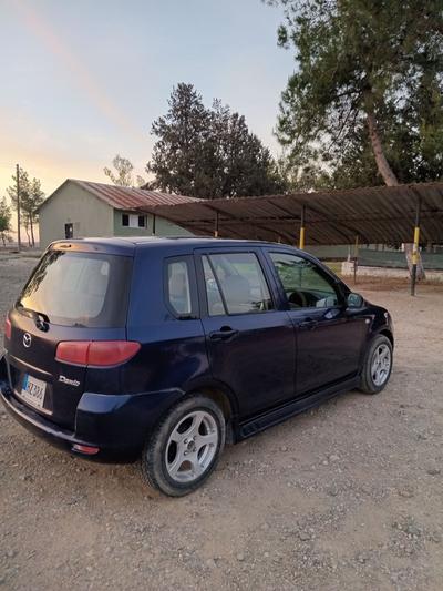 Mazda Demio — 3
