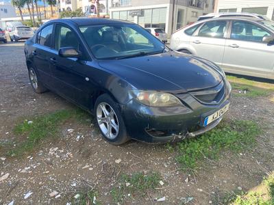 Mazda Axela — 2