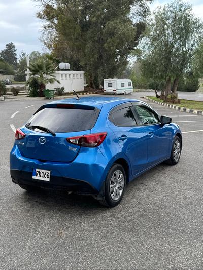 Mazda Demio — 6