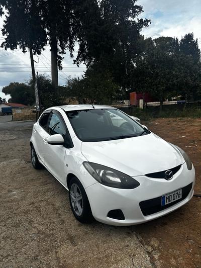 Mazda Demio — 4
