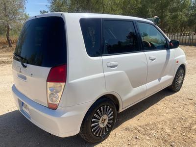 Mitsubishi Dingo — 4