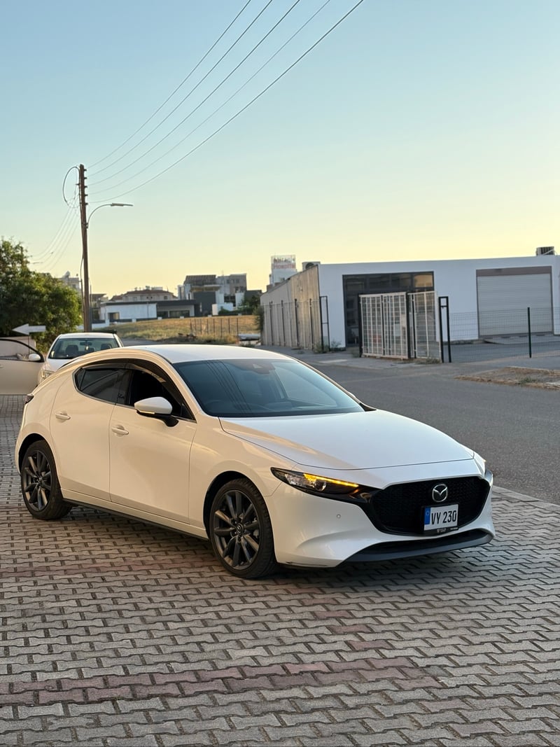 Mazda 3 — 2
