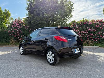 Mazda Demio — 3