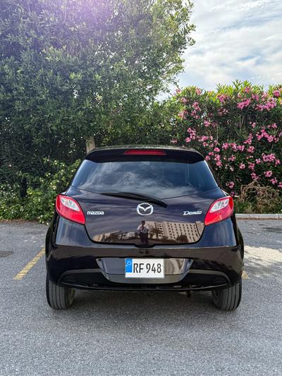 Mazda Demio — 4