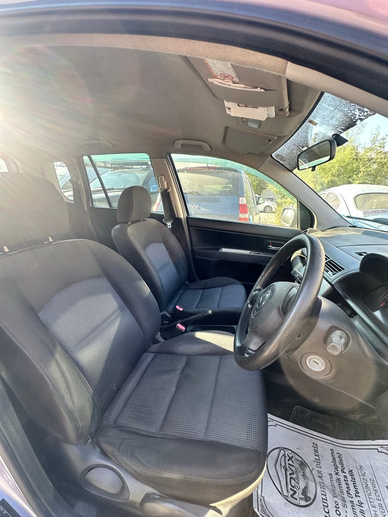 Mazda Demio — 6
