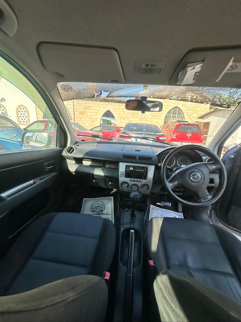 Mazda Demio — 7