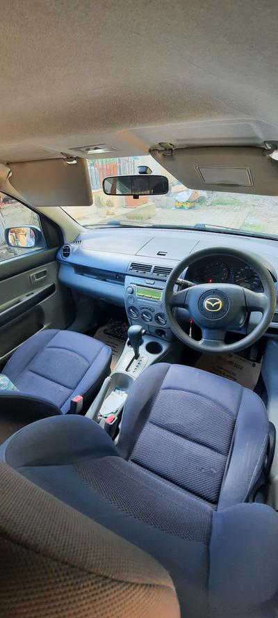 Mazda Demio — 4