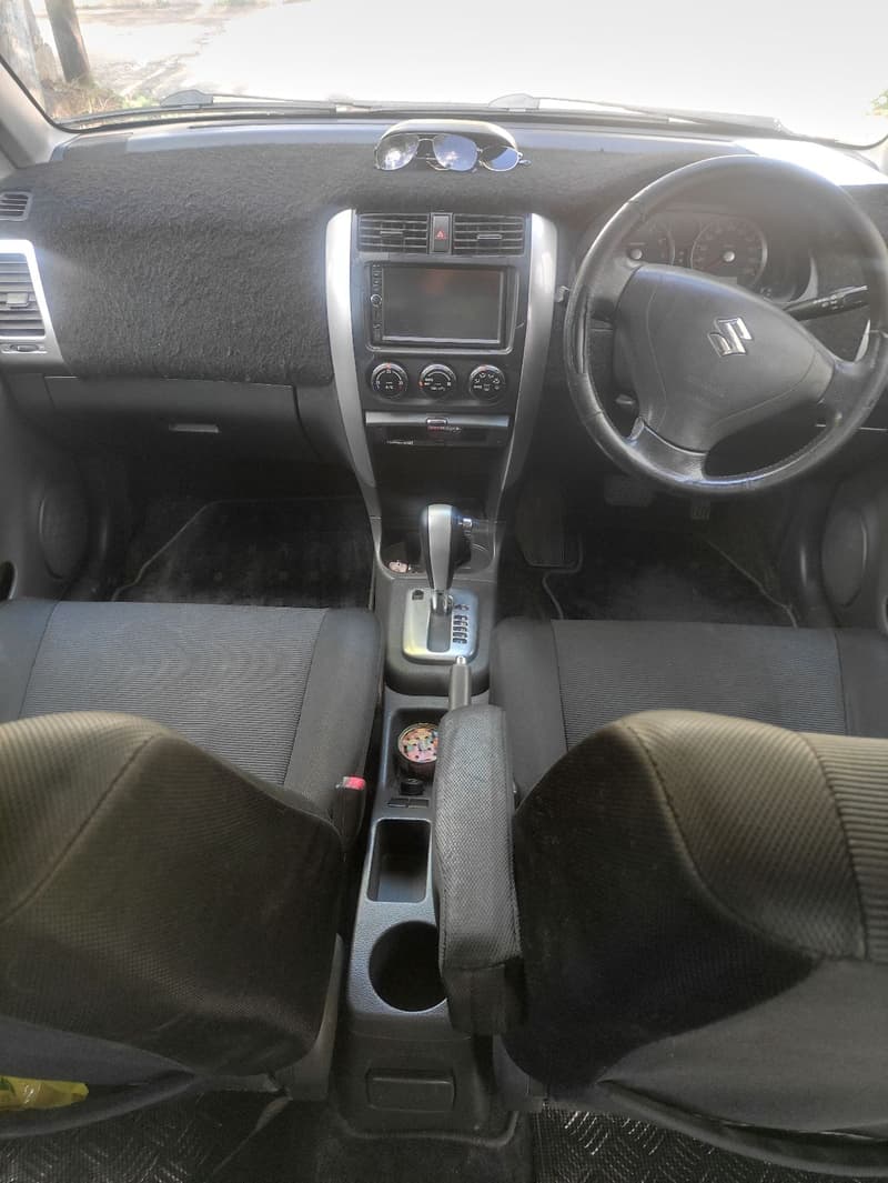 Suzuki Aerio — 1/8