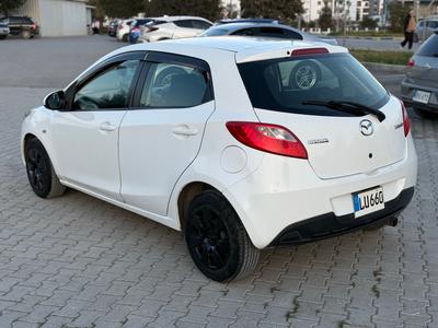 Mazda Demio — 4