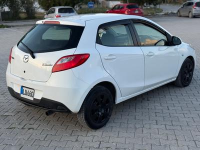 Mazda Demio — 6