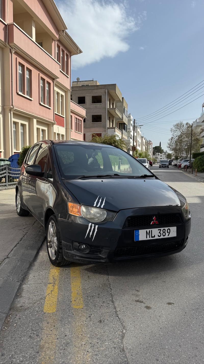 Mitsubishi Colt — 1/4