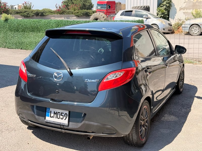 Mazda Demio — 3