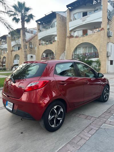 Mazda Demio — 4
