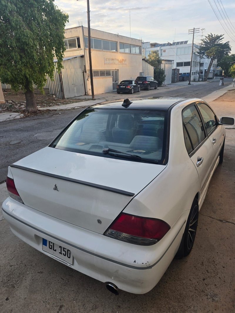 Mitsubishi Lancer — 6