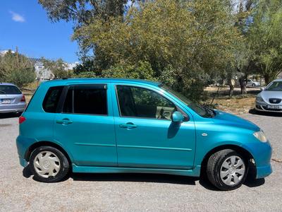 Mazda Demio — 1