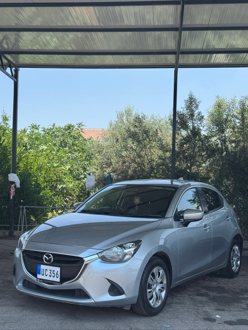 Mazda Demio — 4