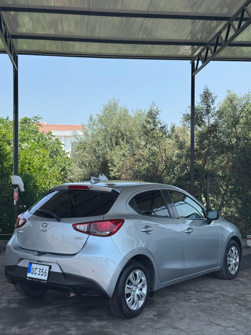 Mazda Demio — 3