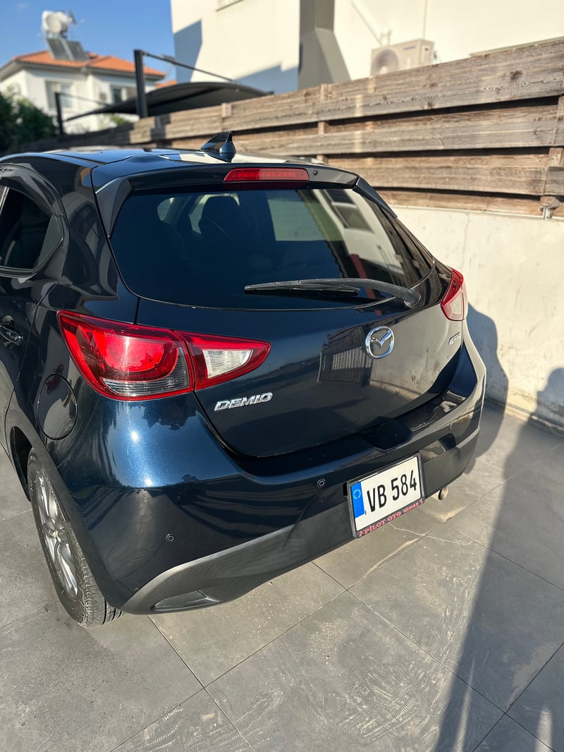 Mazda Demio — 5