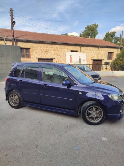 Mazda Demio — 3