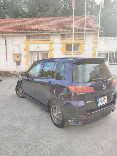 Mazda Demio — 6